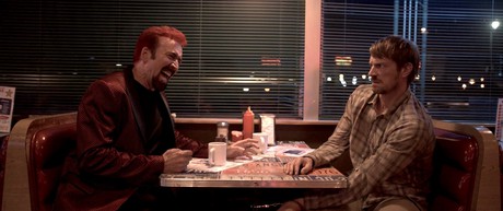 Cage and Kinnaman in SYMPATHY FOR THE DEVIL