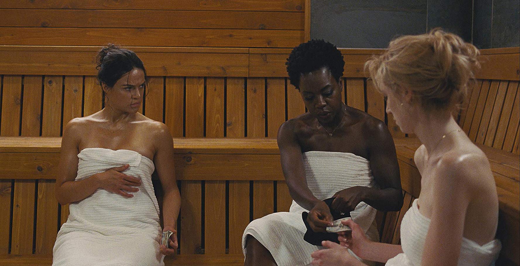 the gals plan a heist in the sauna in WIDOWS