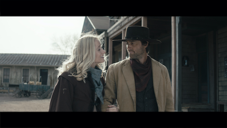 [L-R] Danielle Gross as Mary Primm and Stuart Townsend as Jericho Ford in the western/action film, APACHE JUNCTION, a Saban Films release. Photo courtesy of Saban Films.