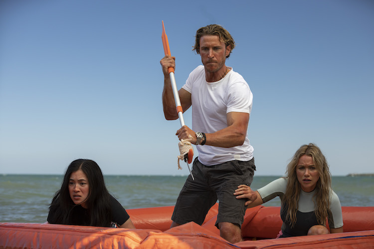 (L-R) Kimie Tsukakoshi as Michelle, Aaron Jakubenko as Charlie and Katrina Bowden as Kaz in the , GREAT WHITE, an RLJE Films and Shudder release. Photo courtesy of RLJE Films and Shudder.