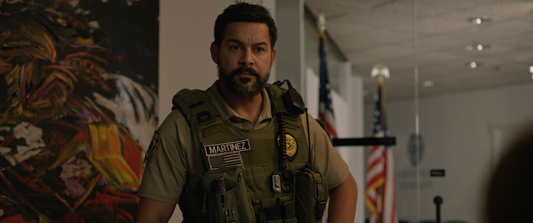 Jon Huertas as Officer Rico Martinez in the horror / thriller “INITIATION,” a Saban Films release. Photo Courtesy of Saban Film