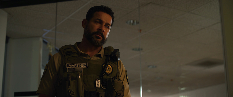 Jon Huertas as Officer Rico Martinez in the horror / thriller “INITIATION,” a Saban Films release. Photo Courtesy of Saban Film