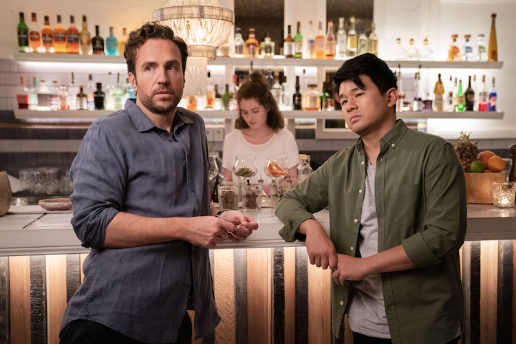 (L-R) Rafe Spall as Teddy and Ronny Chieng as Sam in the romantic comedy film, LONG STORY SHORT, a Saban Films release. Photo courtesy of Brook Rushton.