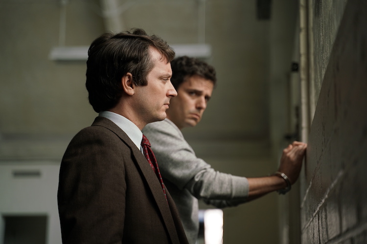 Elijah Wood as Bill Hagmaier and Luke Kirby as Ted Bundy in the drama/thriller, NO MAN OF GOD, an RLJE Films release. Photo courtesy of RLJE Films