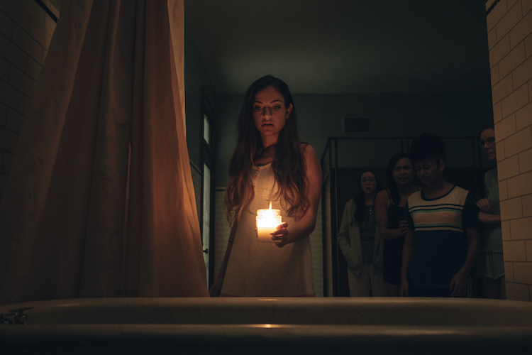 Inanna Sarkis as Alice in the horror SEANCE, an RLJE Films and Shudder release. Photo courtesy of RLJE Films and Shudder.