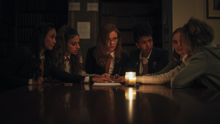 [L-R] Stephanie Sy as Yvonne, Inanna Sarkis as Alice, Madisen Beaty as Bethany, Djouliet Amara as Rosalind, Suki Waterhouse as Camille, and Ella-Rae Smith as Helina in the horror SEANCE, an RLJE Films and Shudder release. Photo courtesy of RLJE Films and Shudder.
