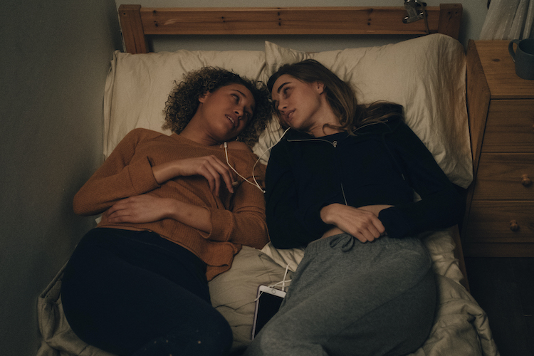 [L-R] Ella-Rae Smith as Helina and Suki Waterhouse as Camille in the horror SEANCE, an RLJE Films and Shudder release. Photo courtesy of RLJE Films and Shudder.