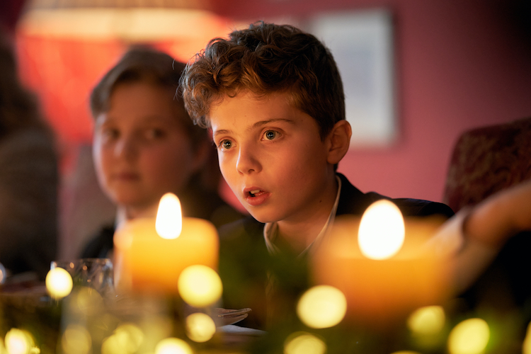 Roman Griffin Davis in the drama/horror SILENT NIGHT, an AMC+ and RLJE Films release. Photo courtesy of AMC+ and RLJE Films.