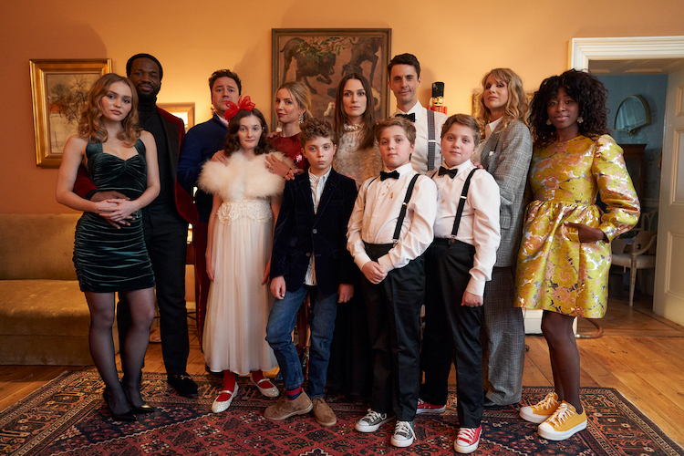 BACK ROW [L-R] Lily-Rose Depp, Ṣọpẹ́ Dìrísù, Rufus Jones, Annabelle Wallis, Kiera Knightley, Matthew Goode, Lucy Punch and Kirby Howell-Baptiste Dìrísù  FRONT ROW [L-R] Davida McKenzie, Roman Griffin Davis, Hardy Griffin Davis, and Gilby Griffin Davis in the drama/horror SILENT NIGHT, an AMC+ and RLJE Films release. Photo courtesy of AMC+ and RLJE Films.