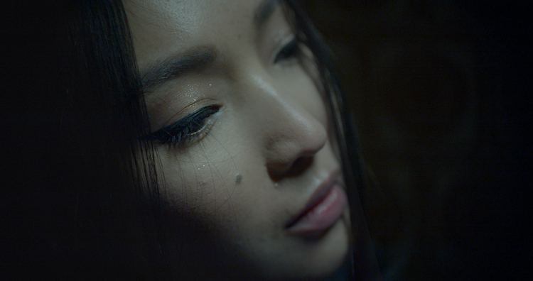 Korlan Madi as Jiao in the thriller film, ZEROS AND ONES, a Lionsgate release. Photo courtesy of Lionsgate. 