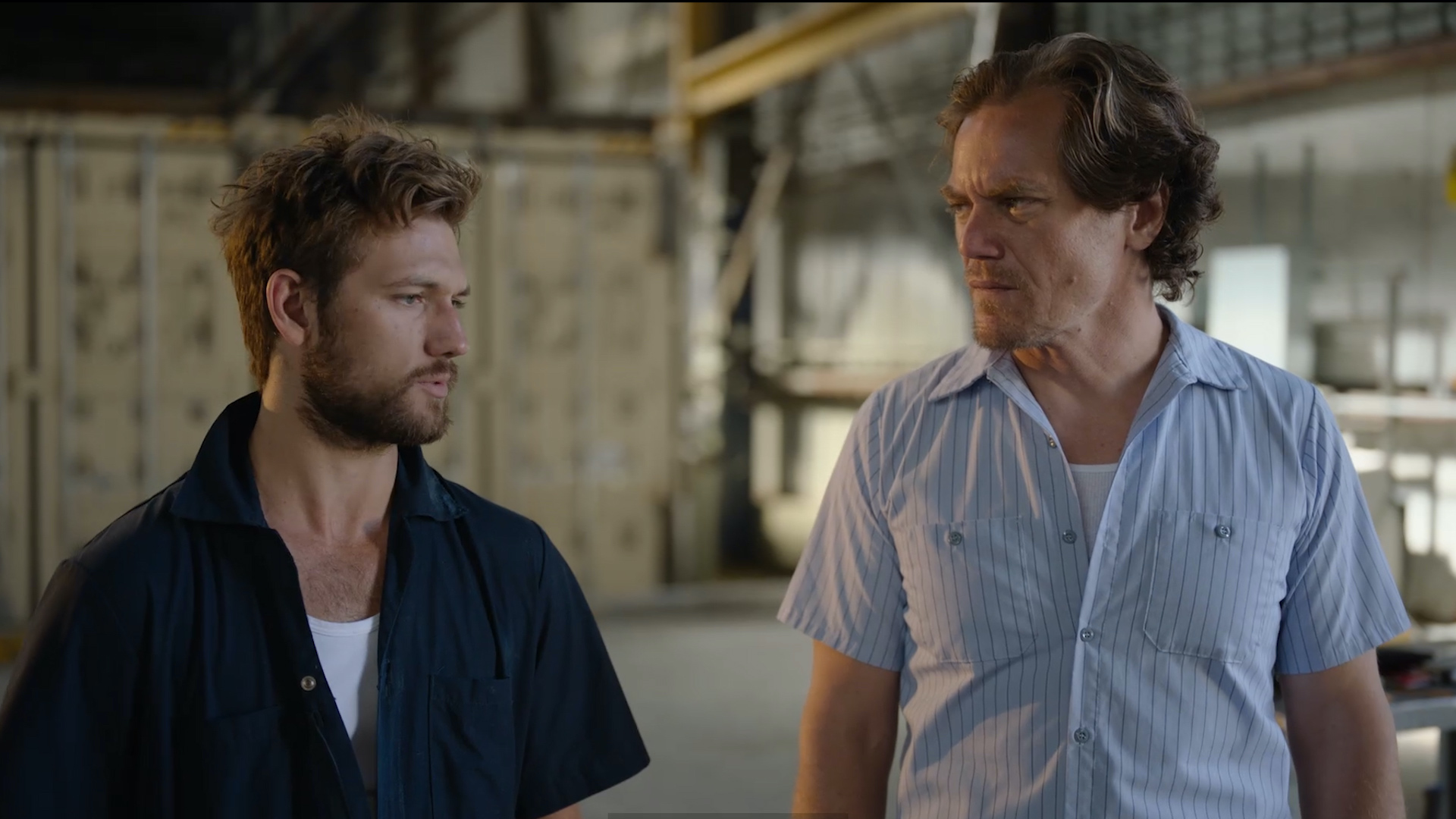 (L - R) Alex Pettyfer as Ellis Beck and Michael Shannon as Mel Donnelly in the action/thriller film, “ ECHO BOOMERS ,” a Saban Films release. Photo courtesy of Saban Films.