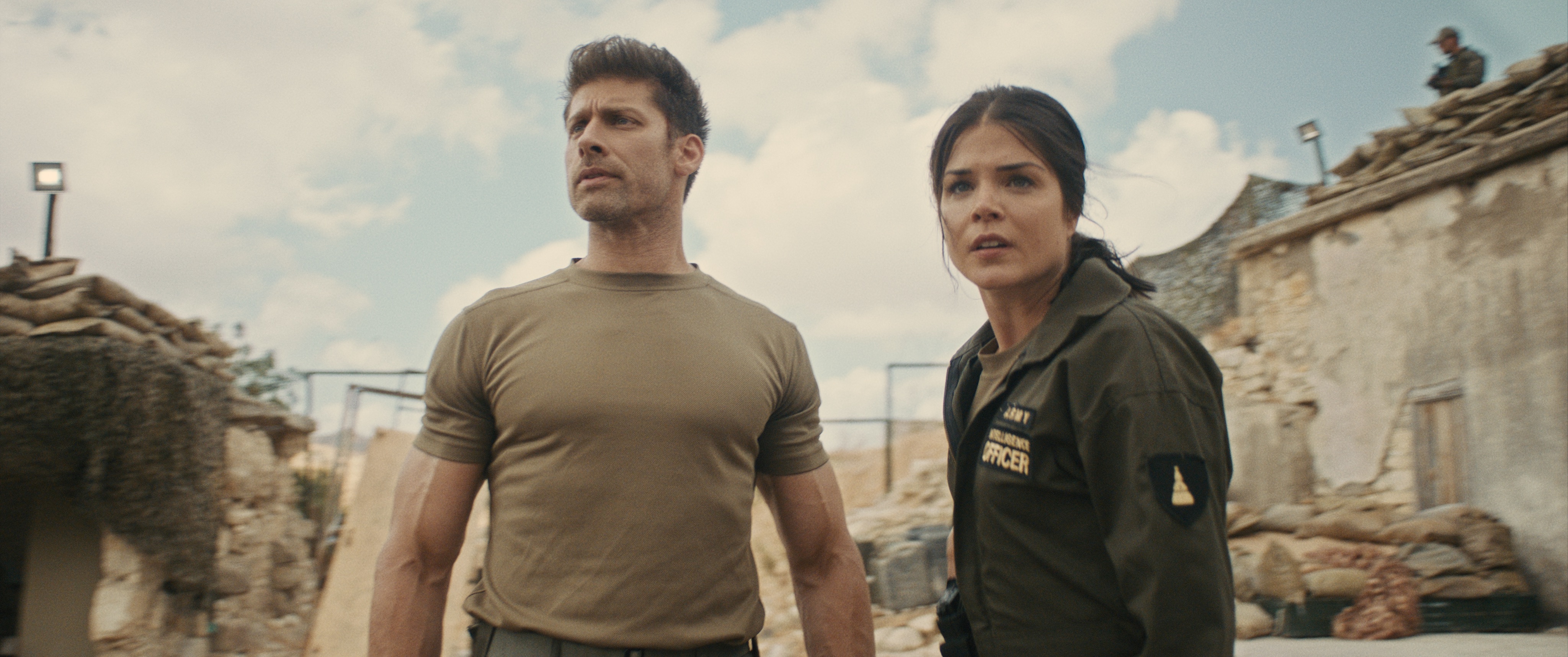 (L - R) Alain Moussi as Jake and Marie Avgeropoulos as Myra in the action/sci - fi film, JIU JITSU , The Avenue release. Photo courtesy of The Avenue