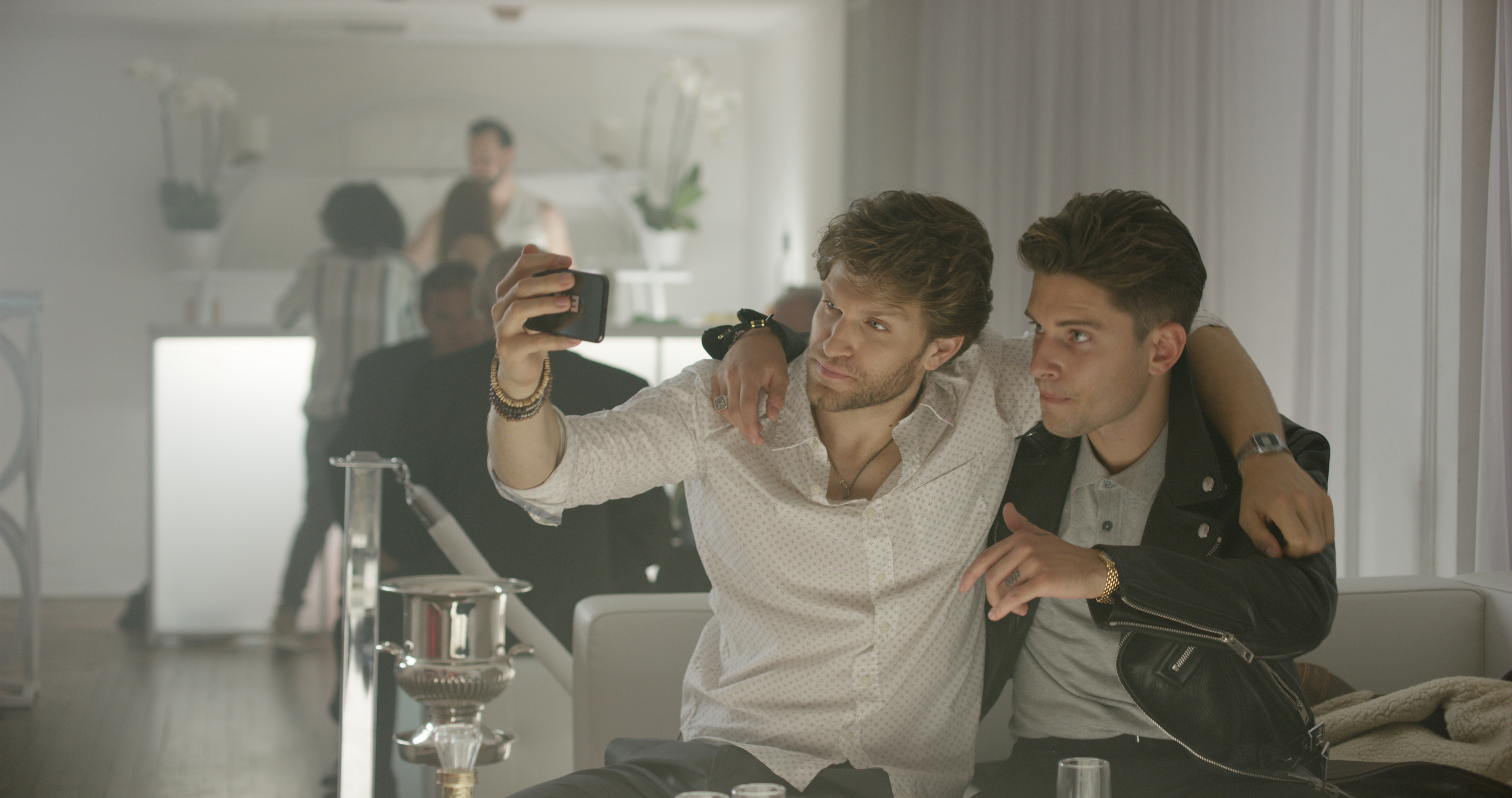 (L - R) Keegan Allen as Cole and Ronen Rubinstein as Alexei in the horror/thriller film “ NO ESCAPE ” a Vertical Entertainment release . Photo courtesy of Vertical Entertainment