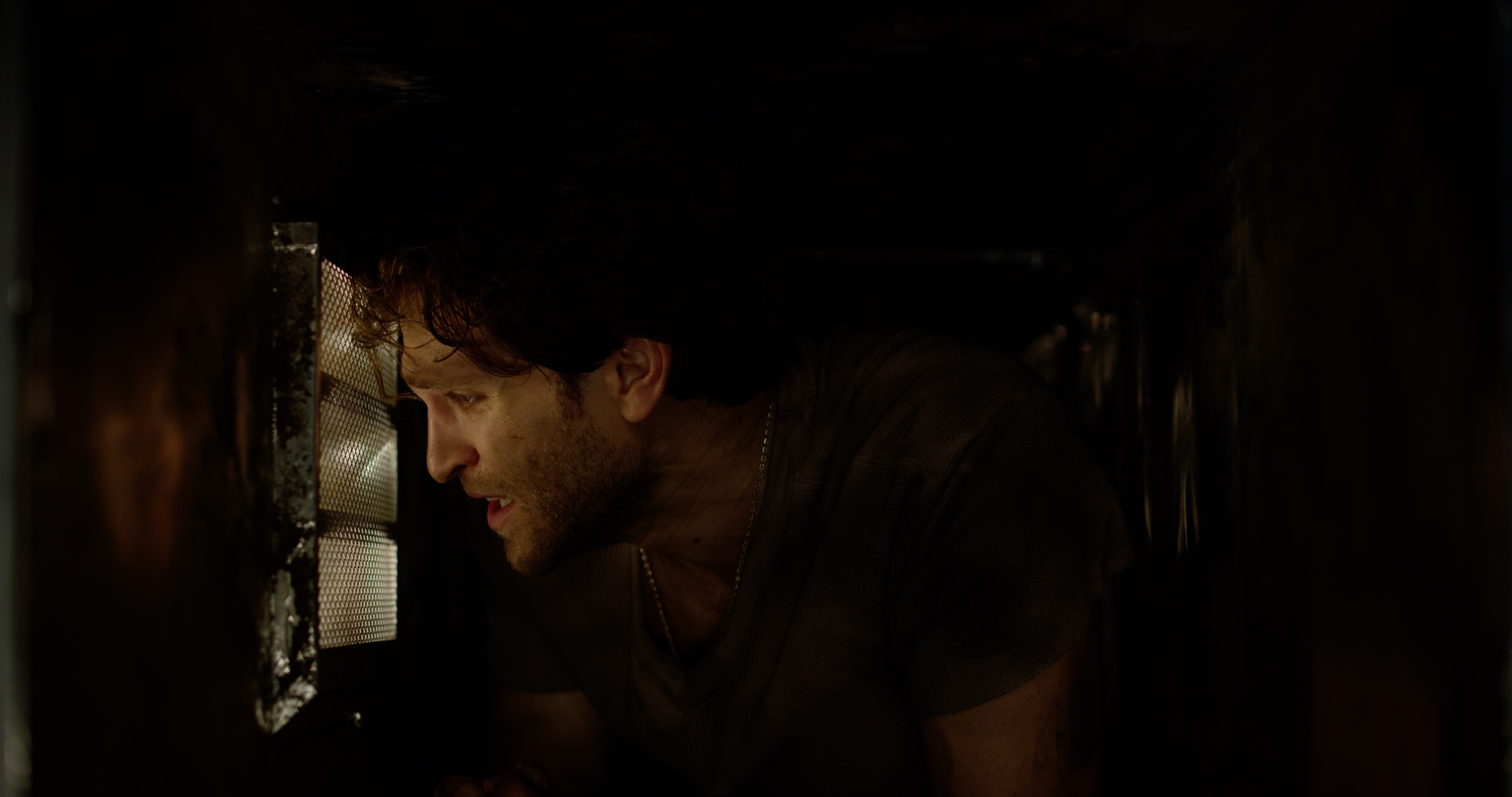 Keegan Allen as Cole in the horror/thriller film “ NO ESCAPE ” a Vertical Entertainment release . Photo courtesy of Vertical Entertainment