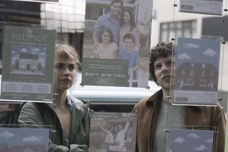 (R-L) Jesse Eisenberg as Tom and Imogen Poots as Gemma in the thriller, “ VIVARIUM ,” a Saban Films release.” Photo Courtesy of Saban Films