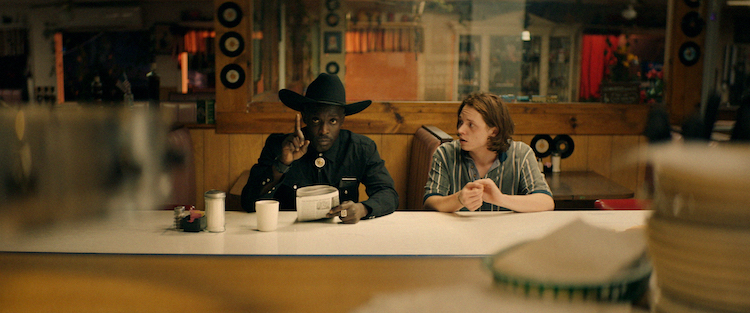 [L - R] Michael Kenneth Williams as Wood and Jack Kilmer as Utah in the thriller BODY BROKERS , a Vertical Entertainment release. Photo courtesy of Vertical Entertainment.