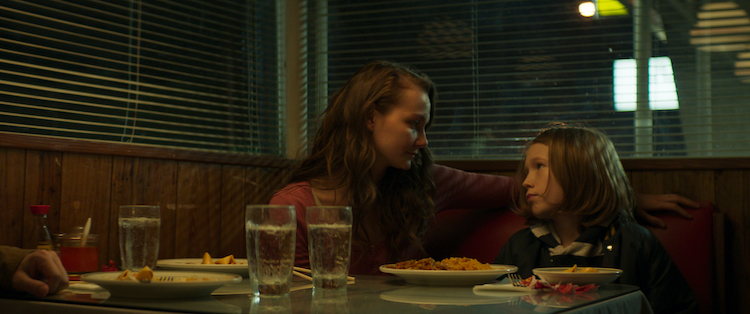 [L - R] Andi Matichak as Laura and Luke David Blumm as D avid in the horror film SON , a RLJE Films/Shudder release. Photo courtesy of RLJE Films.