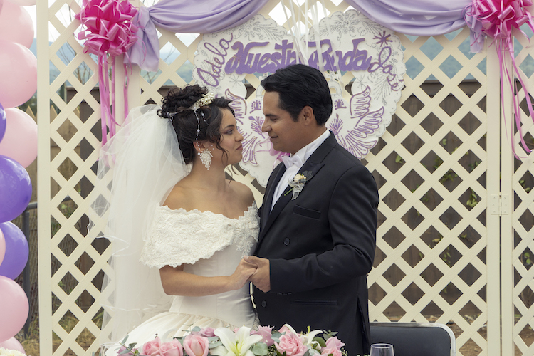 [L-R] Rosa Salazar as “Adela Hernandez” and Michael Peña as “José Hernández” in the drama, A MILLION MILES AWAY, an Amazon Studios release. Photo courtesy of Daniel Daza/Prime.