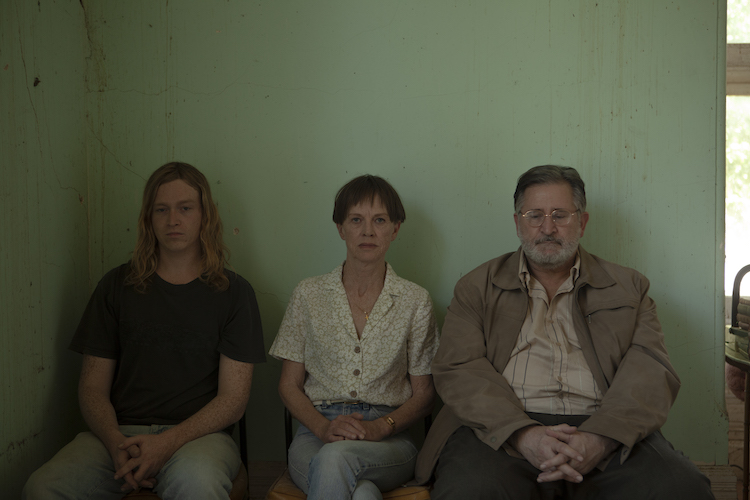 (L-R) Caleb Landry Jones as Nitram, Judy Davis as Mom and Anthony LaPaglia as Dad in the thriller/drama NITRAM, an IFC Films release. Photo courtesy of IFC Films. width=