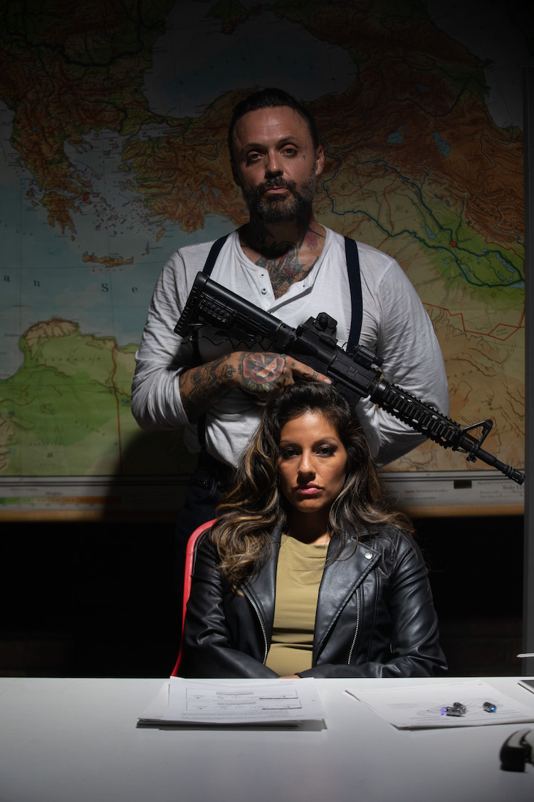 (L-R) Justin Furstenfeld as Ajax Abernathy and Tracy Perez as Liza Mueller in the action film, SECTION 8, an AMC+ and RLJE Films release. Photo courtesy of AMC+ and RLJE Films.