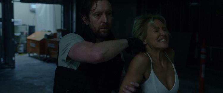 [L-R] Scott Martin as Axel and Nicky Whelan as Brooke in the action film, THE BEST MAN, a Saban Films release. Photo courtesy of Saban Films.