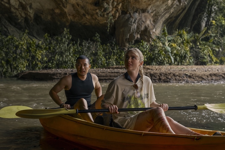[L-R] Tayme Thapthimthong as &ldquo;Wat&rdquo; and Kathryn Newton as "Sara" in the horror thriller, THE DEVIL'S MOUTH, from Amazon MGM Studios. Photo credit Amazon MGM Studios 2026.